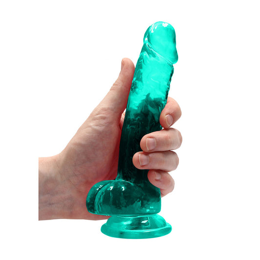REALROCK 7'' Realistic Dildo With Balls. The green dildo held in a hand against a white background.