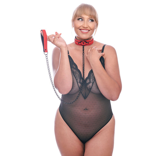Sex & Mischief Amor Collar and Leash. Studio photo of the red restraint on a white background, a further angle.