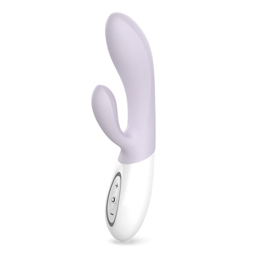 White and purple electronic device on a white background