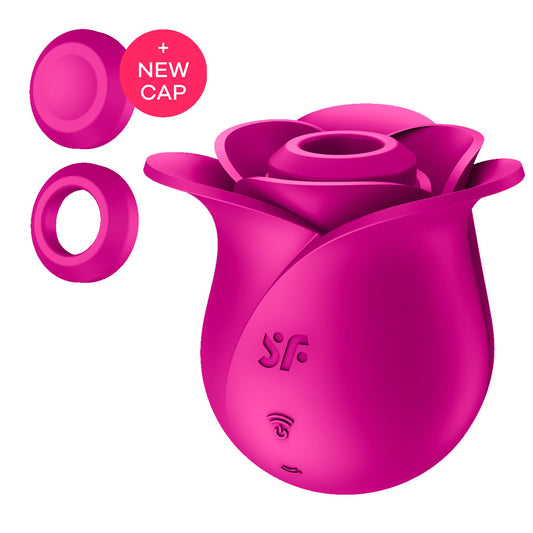 Pink silicone rose-shaped product with a new cap on a white background