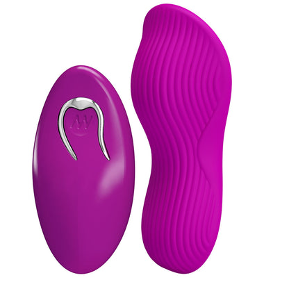 Purple silicone product with a metallic component on a white background