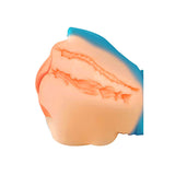 Close-up of a peach with a blue background