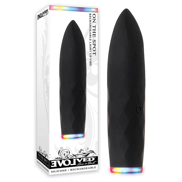 Black silicone product with rainbow lights in packaging on a white background