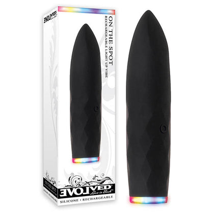 Black silicone product with rainbow lights in packaging on a white background