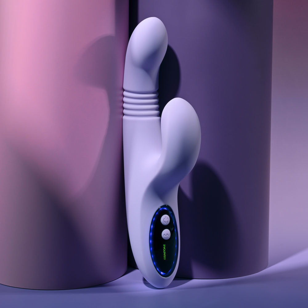 Evolved PEP TALK Purple 23.3 cm Thrusting Vibrator with Tapping. Styled with other products, another angle.