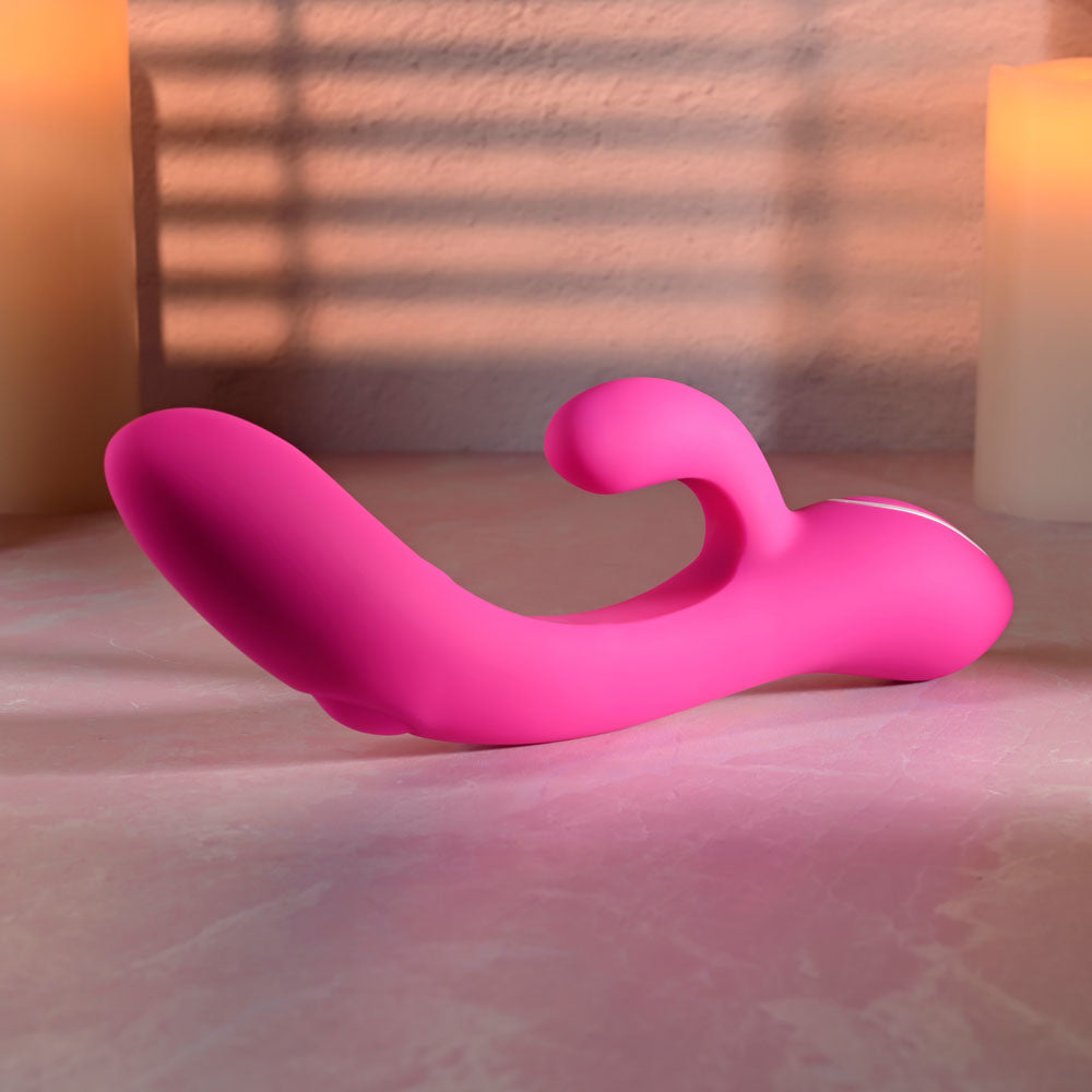 Evolved G-TAPPER Pink USB Rechargeable Rabbit Vibrator. Styled with other products, a further angle.