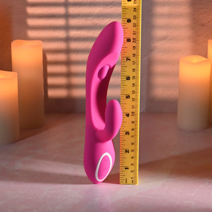 Evolved G-TAPPER Pink USB Rechargeable Rabbit Vibrator. Styled with other products, a sixth view.