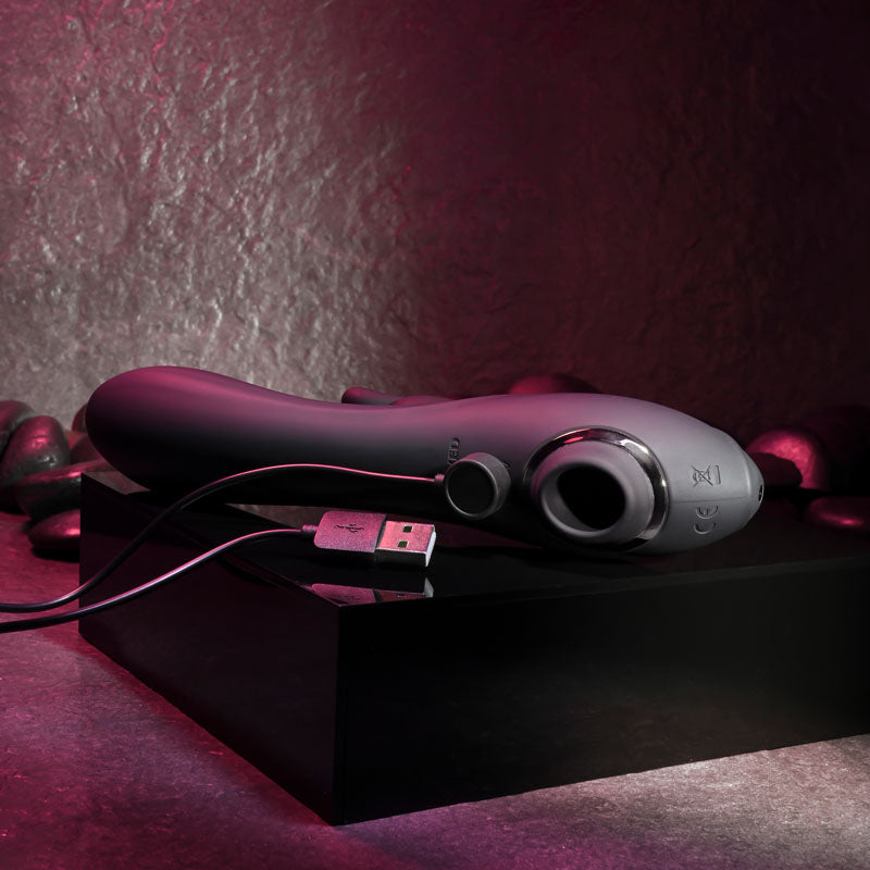Evolved RABBIT HOLE. The black vibrator on a red surface, another angle.