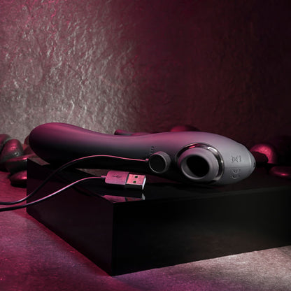 Evolved RABBIT HOLE. The black vibrator on a red surface, another angle.