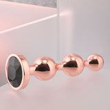 Gender X GOLD DIGGER SMALL - Rose Gold Small Butt Plug with Black Gem Base - Image 5