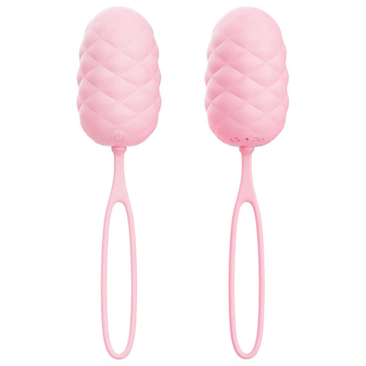 Adam & Eve Pillow Talk Vibrating Egg. Full view of the pink product on a white background, another angle.