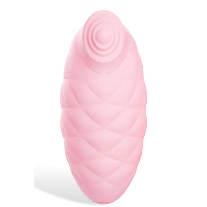 Pink silicone massager on a white background