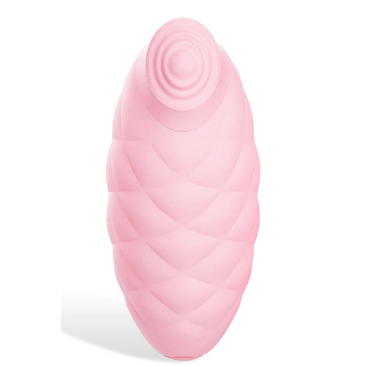 Pink silicone massager on a white background