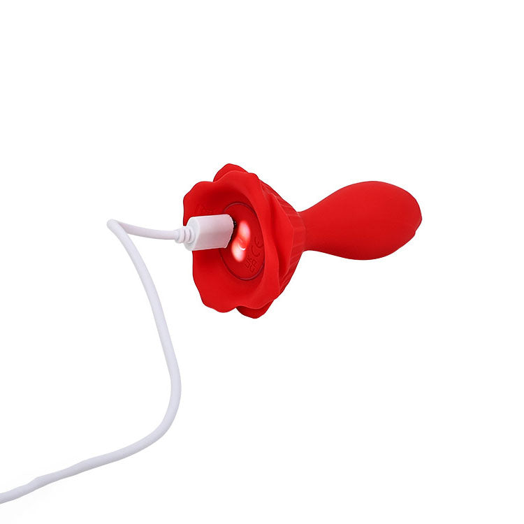 Adam & Eve THE ROSEBUD. Full view of the red butt plug on a white background, a third view.
