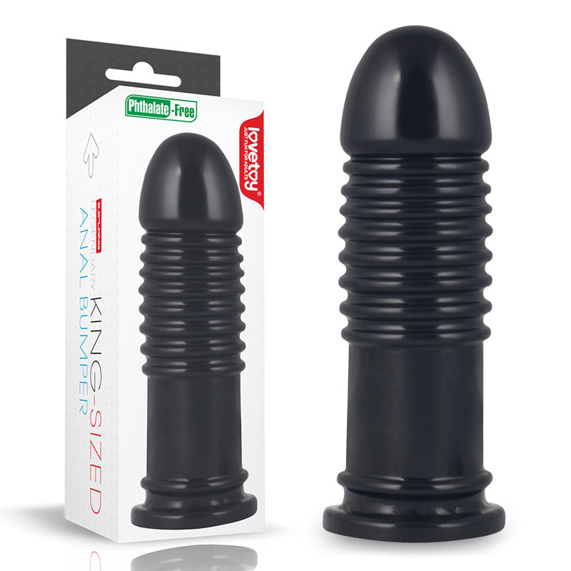 King Sized 8'' Anal Bumper. The black butt plug shown with its retail packaging on white, another angle.