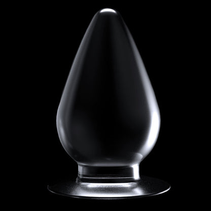 Flawless Clear Anal Plug 4.5''. The butt plug on a coloured surface, a further angle.