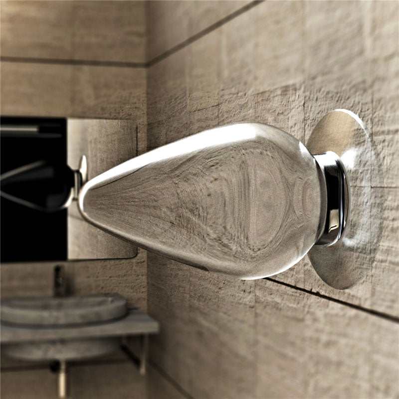 Flawless Clear Anal Plug 4.5''. The butt plug on a coloured surface, a fifth view.