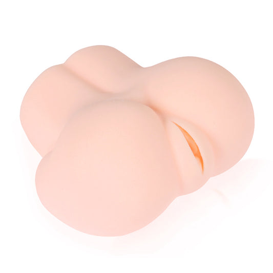 Kokos Mini Butt Angel 1. Studio photo of the flesh stroker on a white background, another angle.