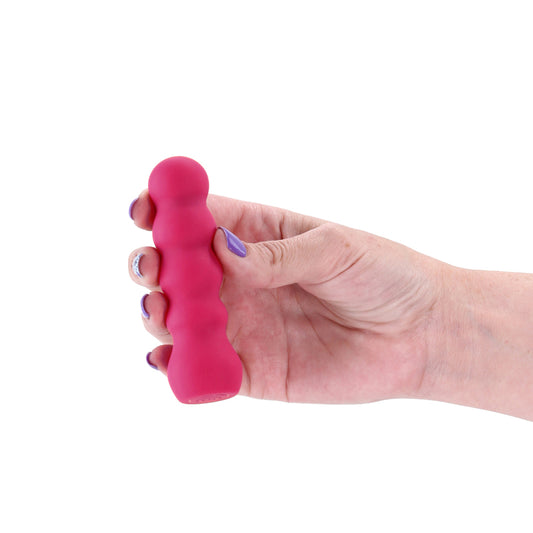 X & O's Embrace Rose 9.9 cm USB Rechargeable Bullet. Studio photo of the bullet on a white background, wider framing.