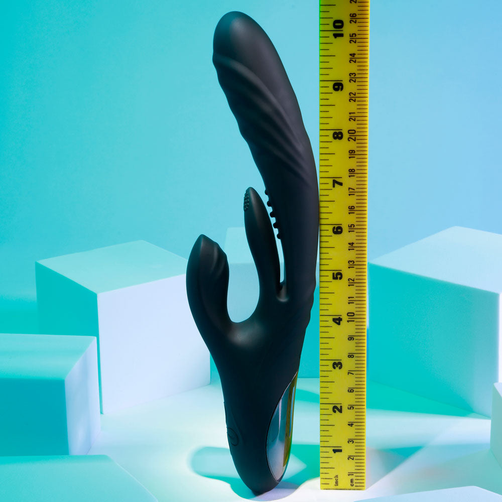 Black tool with a yellow measuring tape on a blue geometric background