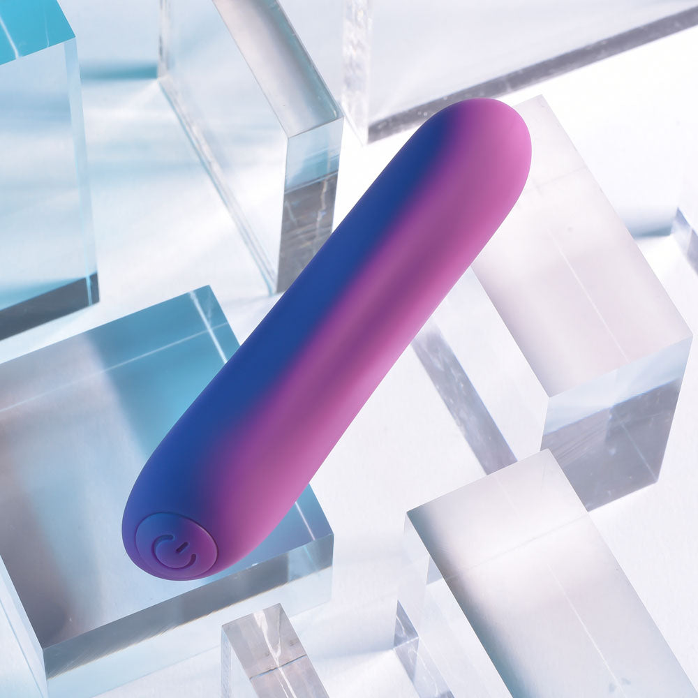 Purple cylindrical object on a geometric abstract background