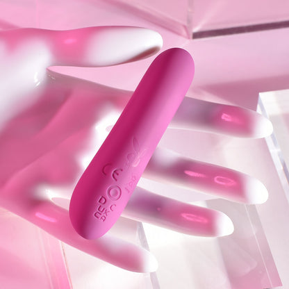 Pink silicone product with brand logo on a pink abstract background