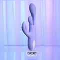 Purple toy with 'Playboy' branding on a gradient background