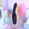 Black electronic device on a stand with 'Playboy' branding against a colorful geometric background