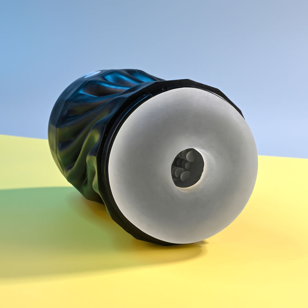 Glass object with a textured surface on a gradient background
