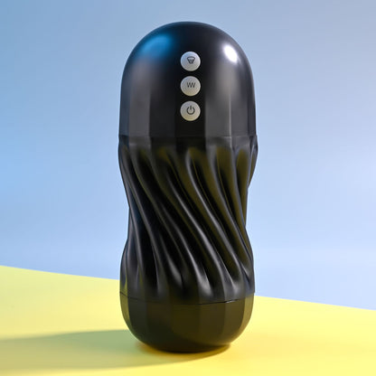 Black textured cylindrical device with control buttons on a yellow and blue gradient background