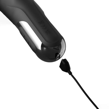 Black electronic device with a plug on a white background
