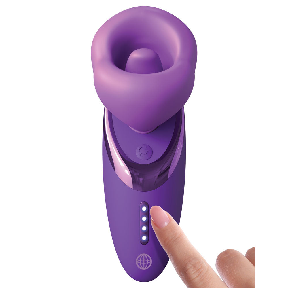 Purple electronic device with a finger pressing a button on a white background