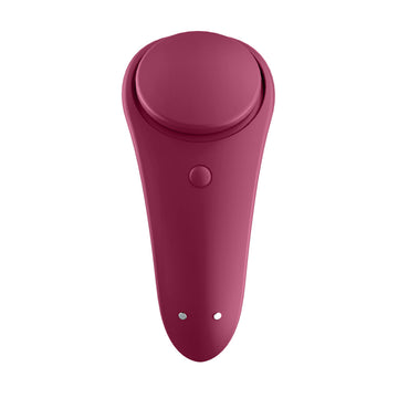Pink handheld device on a white background