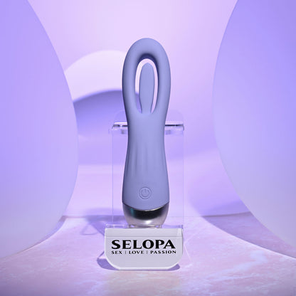 Silicone product on a stand with 'SELOPA' branding against a light purple background
