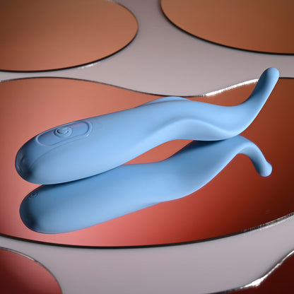 Blue silicone tool on a red and gray background