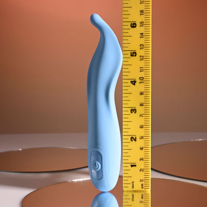 Blue curved tool next to a yellow measuring tape on a reflective surface with a brown background