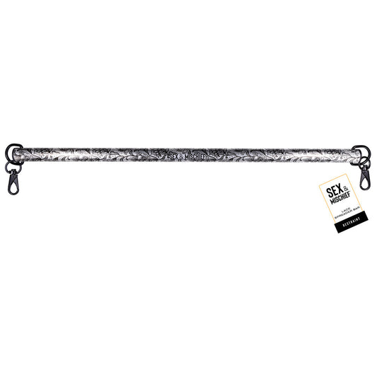 Sex & Mischief Lace Spreader Bar. Full view of the restraint on a white background, wider framing.