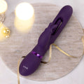 Purple electronic device labeled 'Vive' on a marble surface with blurred lights in the background