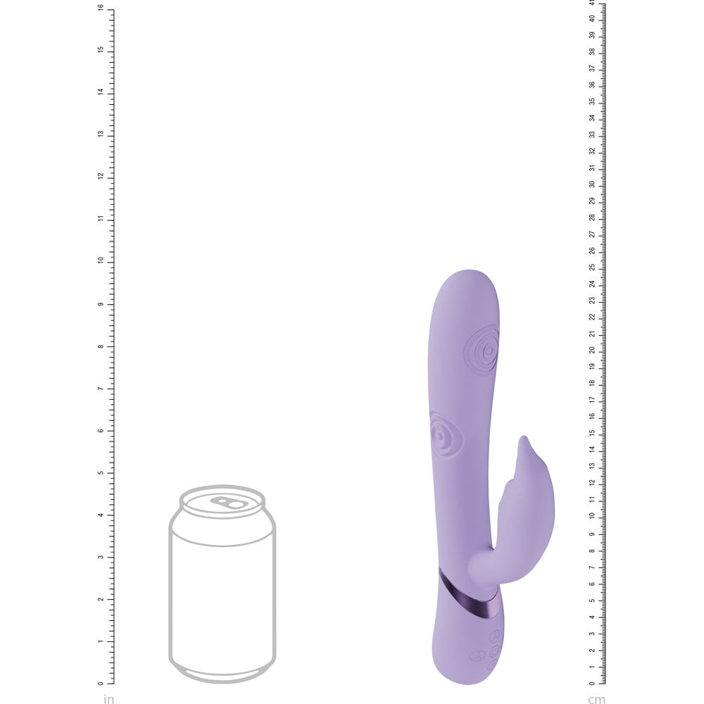 Purple toy with a can of soda for scale on a white background