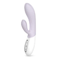 White and purple electronic device on a white background