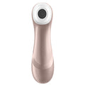 Rose gold and white Satisfyer product on a white background